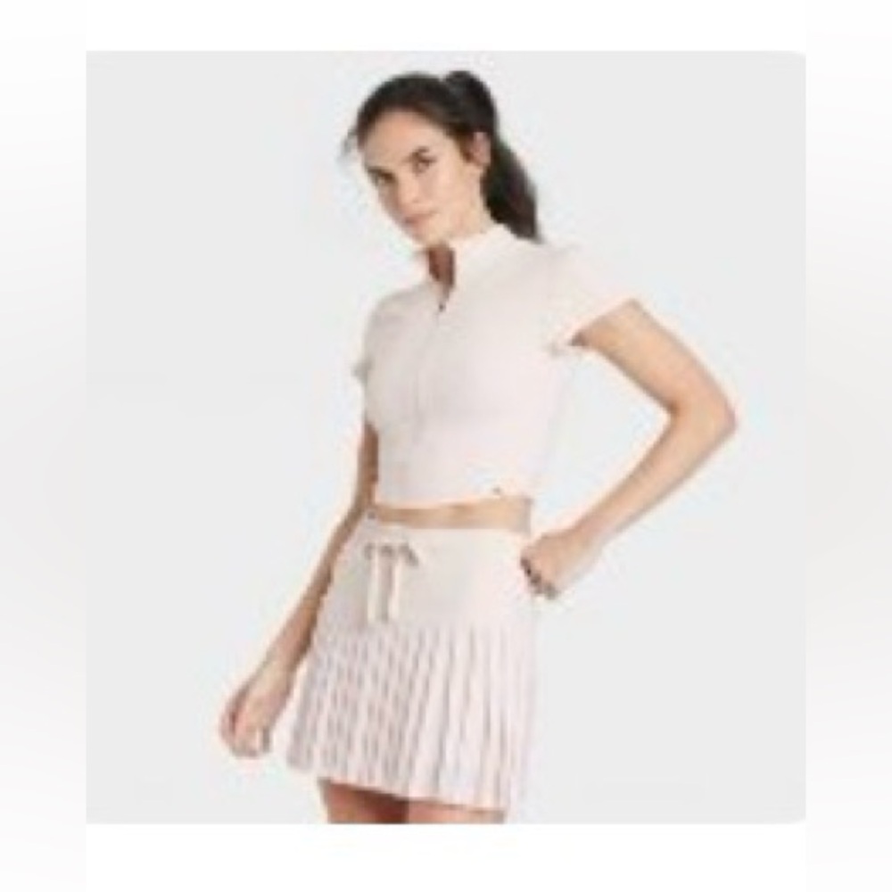 JoyLab Beige Zip-Up Activewear Top and matching mesh pleated high rise skort